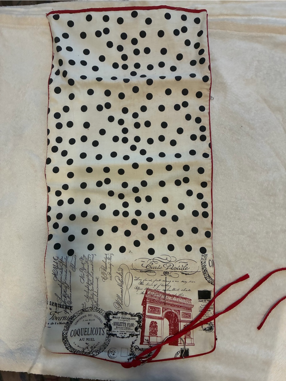 Polka Dot Drawstring Travel Bag in White and Black with Red Trim with French